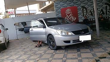 ls 400: Mitsubishi Lancer: 2004 г., 1.6 л, Механика, Бензин, Седан — 5