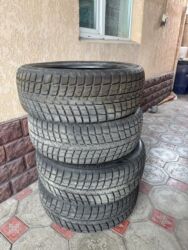 шины внедорожные: Комплект зимних шин (4 шт.) - Размер: 255/45 R21 - Индекс