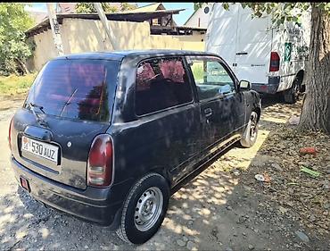 дейхатсу куоре: Daihatsu Cuore: 2001 г., 0.1 л, Механика, Бензин, Хэтчбэк — 3