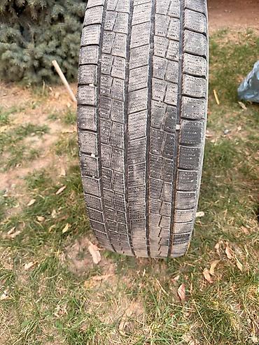 10 00r20: Зимняя шина Goodyear размером 215/70 R16 100T. 4-шт комплект — 1