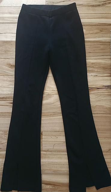 OVS Kids crne pantalone za devojčice, vel 12, punije - Model na lalafo.rs OVS Kids crne pantalone za devojčice, vel 12, punije - Model