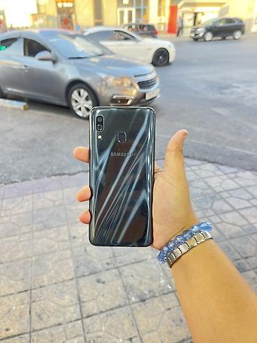goy su: Samsung Galaxy A30, 64 GB, rəng - Göy, Barmaq izi — 1