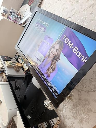 teve stent: Ağ rəngli TV stendi ve Sony Televizor iksi bir yerde SATILIR - Sony — 3
