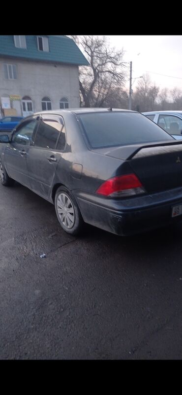 Mitsubishi: Mitsubishi Lancer: 2002 г., 1.5 л, Вариатор, Бензин, Седан