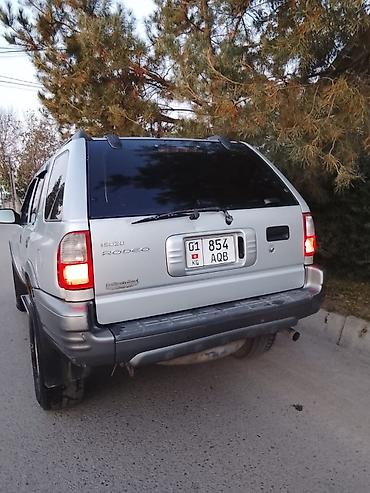golf 2 8: Isuzu Rodeo: 2002 г., 2.2 л, Автомат, Газ, Внедорожник — 5