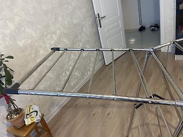 2 ci perde: Metal geyim qurudan asılqan – üçayaqlı, qatlanan model — 1