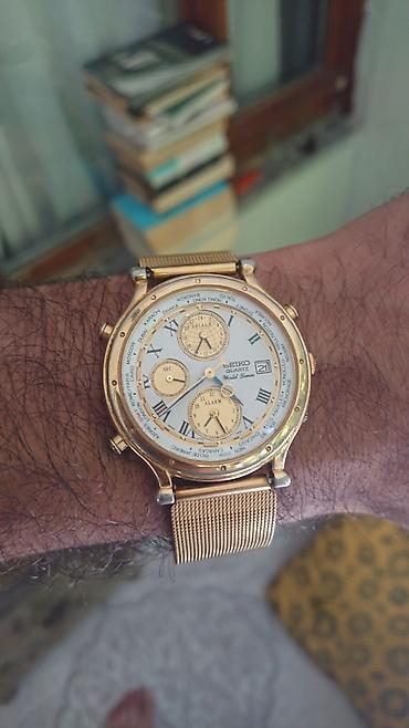 saat michael kors: Seiko Quartz World Timer qol saatı - Model: Seiko 5T52-7A19 (arxa — 2