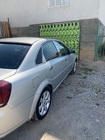 с номерами: Daewoo Lacetti: 2004 г., 1.6 л, Автомат, Бензин, Седан — 2