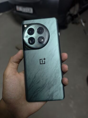 купить кнопочный сотовый телефон: OnePlus 12, Б/у, 512 ГБ, цвет - Зеленый, 2 SIM