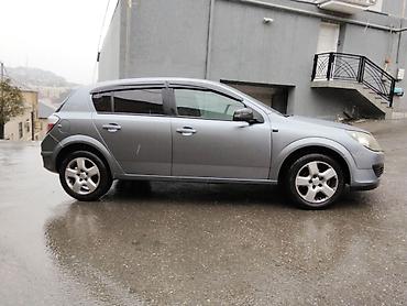 Opel: Opel Astra H, 5 qapılı hetçbek, boz rəng. - Yığcam və praktik kuzov — 2