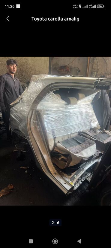 Bamperlər, buferlər: Toyota Corolla markalı avtomobilin arxa hissəsi. Avtomobilin arxa