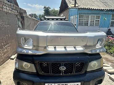Бампер и комплектующие: Передний бампер для Subaru Forester SF (2002). Пара состоится хорошая — 3
