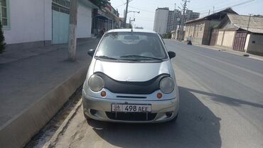 скупка бу шины: Серебристый автомобиль Daewoo Matiz, компактный городской хэтчбек