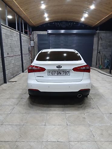 авто фольксваген: Kia Cerato: 1.6 л | Седан — 5