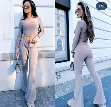 Pantalone: L (EU 40), Visok struk, Zvoncare — 19