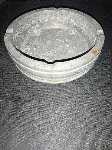 5 ayliq usaq sekilleri: Antik Metaldan hazırlanmış külqabı. Dairəvi formadadır, üst hissəsində — 1