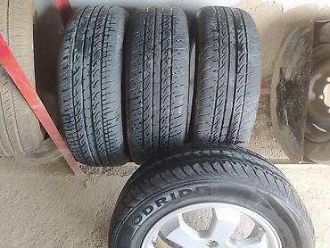 islenmis teker satisi: 4 ədəd yığılmış disk+şin komplekti əla vəziyyətdədiler pirus diskidi — 4