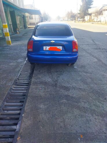 Другие автомобили: Седан синего цвета, компактный и экономичный. Кузов 4‑дверный — 7