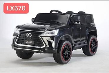 Детский электромобиль в стиле Lexus LX570. Кузов выполнен в черном