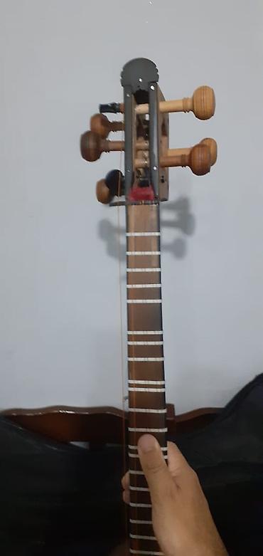 Tar: Tar – milli simli musiqi aləti - Korpus: ikiqat armud formalı — 8