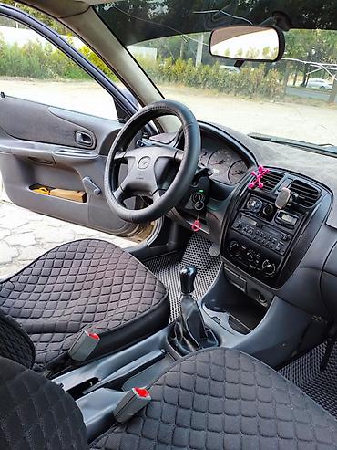 Mazda: Mazda 323: 1998 г., 1.5 л, Механика, Бензин, Седан — 6