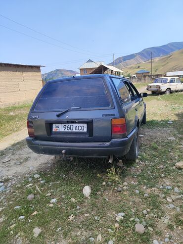 обмен авто в бишкеке: Mazda Familia, модель "универсал", окрашенная в темно-серый цвет