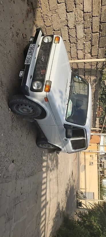 niva neftçala: LADA Niva 4x4 (ağ rəng, 3 qapı, kuzov “hatchback/SUV” tipli) — 2