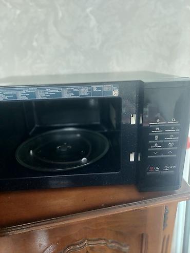 samsung mikrodalğalı soba: Samsung mikrodalğalı soba - Model xətti: Samsung, qara korpus, ön — 3