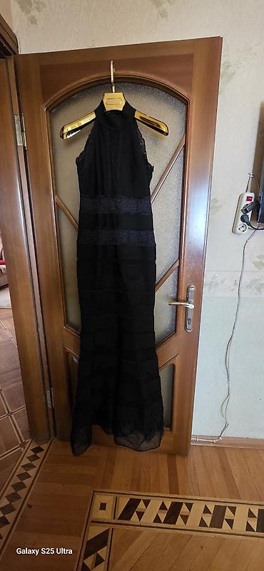 Qara uzun ziyafət/libas - Rəng: qara - Stil: uzun, axıcı etekli -