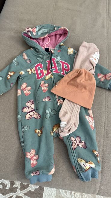 детские электромобили бу: Комбинезон 1-2 года 
Б/у 
Новые колготки 80р и шапка в подарок