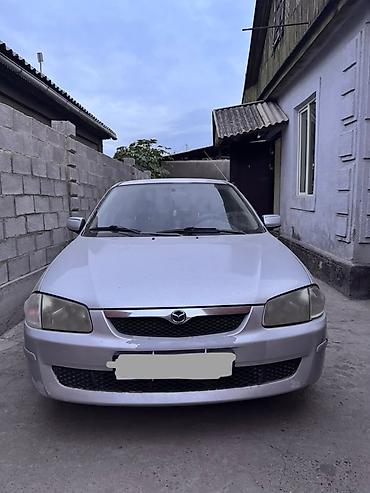 Mazda: Mazda 323: 1999 г., 1.5 л, Автомат, Бензин, Седан — 1