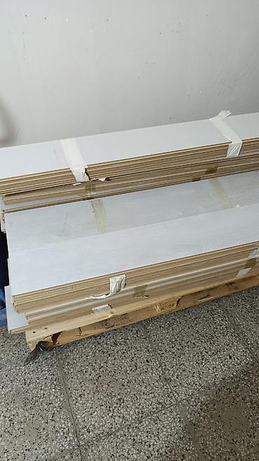 Təmir və tikinti: Açıq boz rəngli laminat döşəmə taxtaları - Material: Laminat (taxta — 2