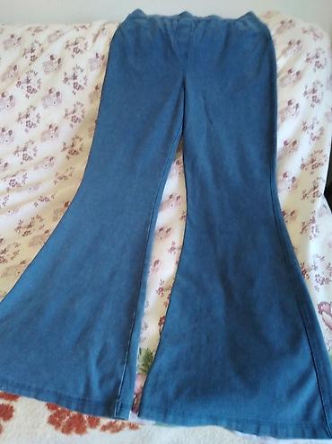 ramaks pantalone: LC Waikiki ženske pantalone – plave, zvoncare - Model: zvonaste — 2