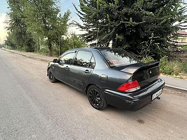 m5 e60 v10: Mitsubishi Lancer: 2002 г., 2 л, Автомат, Бензин, Седан — 3