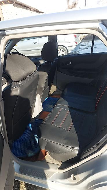 Mazda: Mazda 323: 2002 г., 1.6 л, Механика, Бензин, Универсал — 8