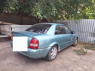 mazba 323: Mazda 323: 2001 г., 1.6 л, Механика, Бензин, Седан — 2