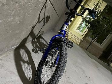 irsad telecom velosiped: Mavi rəngli BMX tipli velosiped. Kompakt ölçülü çərçivəyə malikdir və — 2