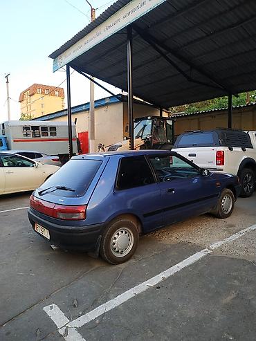 Mazda: Mazda 323: 1990 г., Механика, Бензин, Хэтчбэк — 9