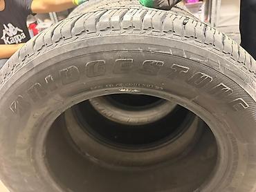 Другие автоуслуги: Комплект из 4 шин Bridgestone Dueler H/T. - Размер: 265/60 R18 - — 10