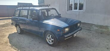 ваз 2106 ош: Автомобиль ВАЗ-2104 синего цвета. На крыше установлен багажник для