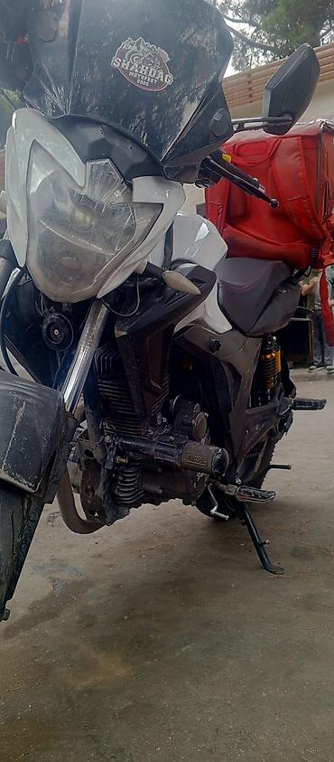Motosiklet – gündəlik sürüş və kuryer işləri üçün praktik şəhər