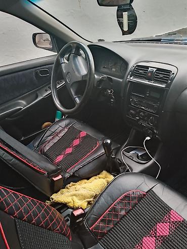 smart plus: Mazda 626: 1997 г., 1.8 л, Механика, Седан — 7
