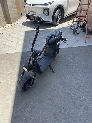 Elektrik nəqliyyatı: Şəhər daxili rahat və səssiz gediş üçün elektrik skuter — 2