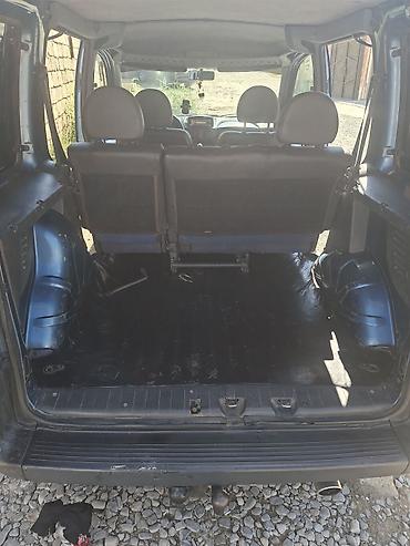 Fiat: Fiat Doblo (mavi rəng, miniven/furqon gövdə) Xüsusiyyətlər: - Geniş — 7