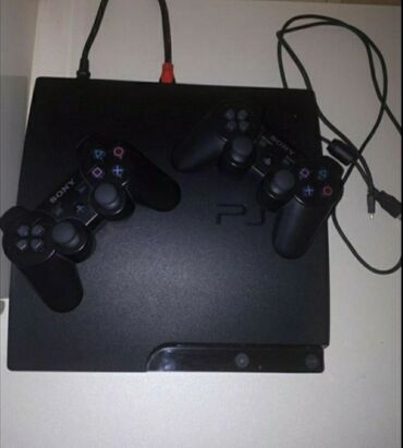 PS3 (Sony PlayStation 3): Ps3 Slim Madelidir iki ədəd 🎮🎮 Yaddaşında 20 oyun var Yaxşı