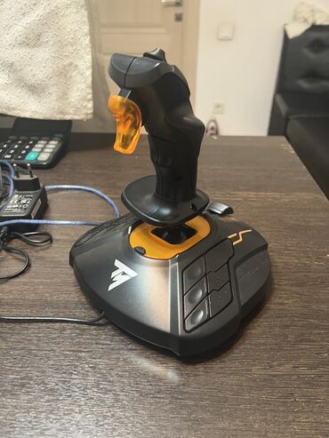 Техника и электроника: Джойстик Thrustmaster T.16000M

Как новый