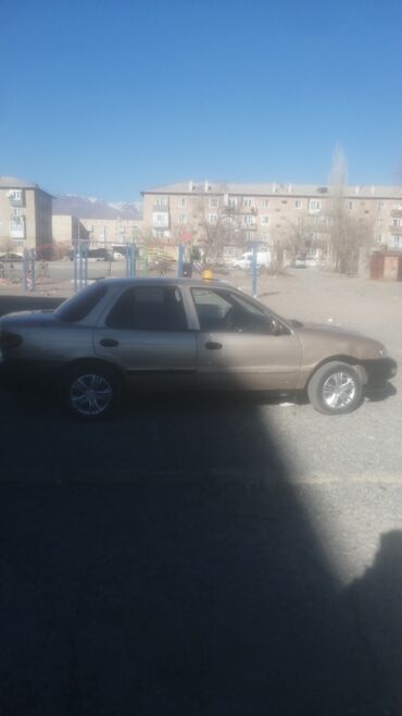 Kia: Kia Sephia: 1996 г., 1.6 л, Механика, Бензин, Хэтчбэк