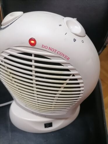 Kaloriferi: Grejalica duvaljka 2 brzine plus ventilator Saturn 2000w Okreće pri — 4