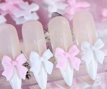 Nega noktiju: Set minijaturnih ukrasnih privesaka za nokte u obliku mašnica — 4