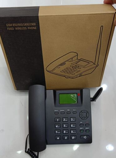 islenmis telefonlar ucuz qiymete: Qara rəngdə, stasionar simsiz telefon. GSM 850/900/1800/1900